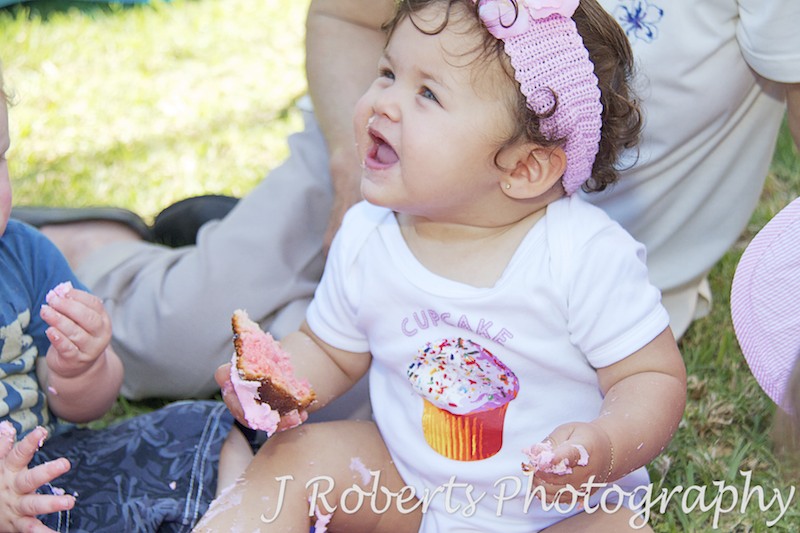 party girl enjoying eating her birthday cake - Party Photography Sydney